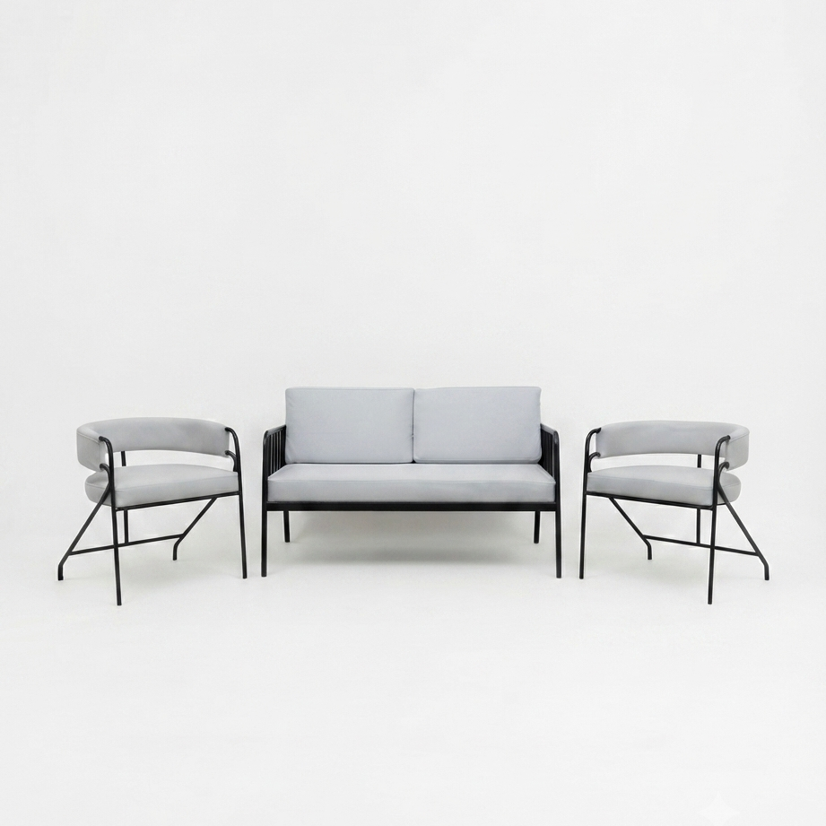 A modern three-piece living room furniture set consisting of a two-seater sofa and two matching armchairs with light gray fabric upholstery and black metal frames, set against a seamless white studio background.